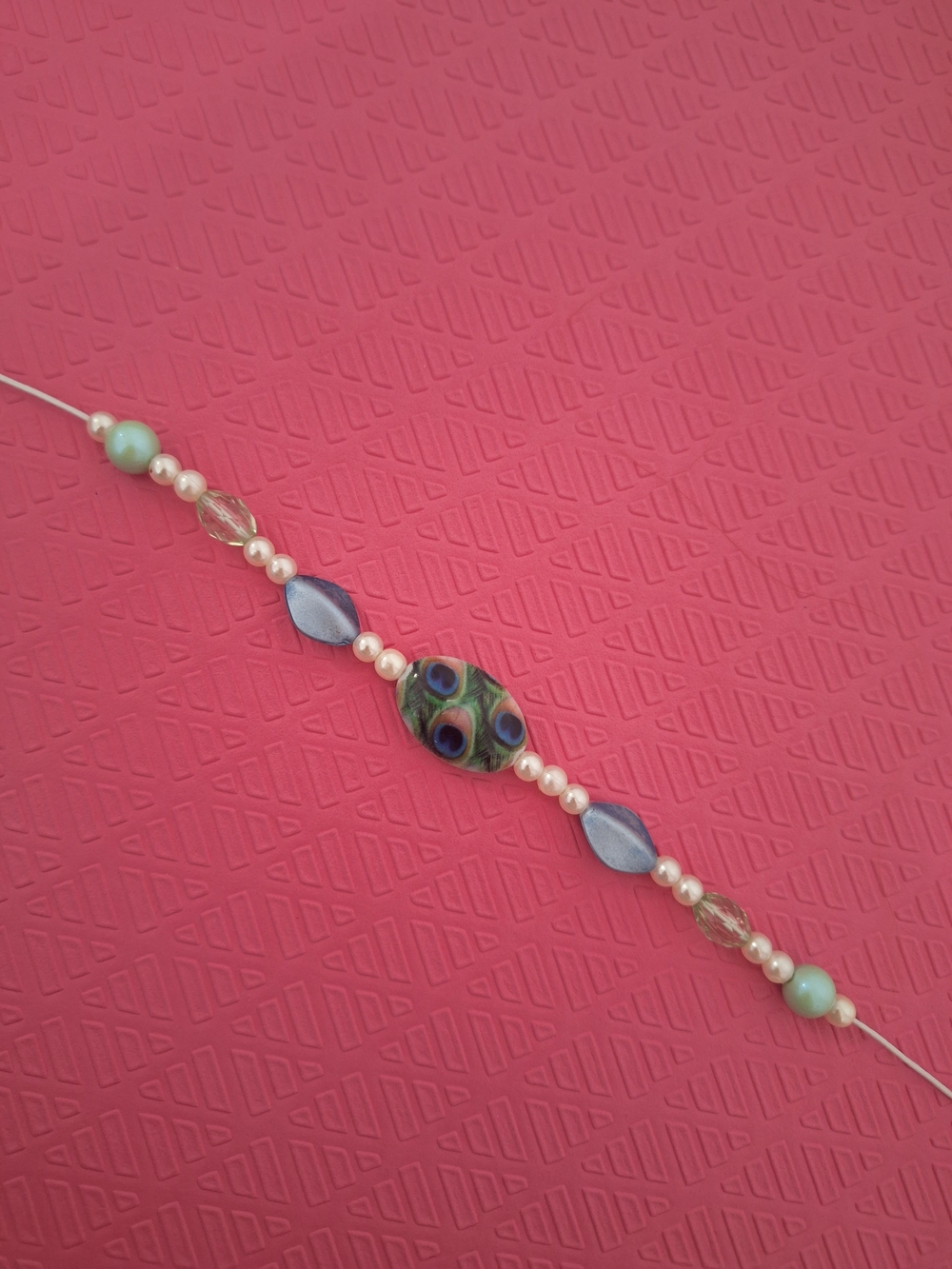 Accessorize Peacock Motif Bead Bracelet with Blue and Green Accents
